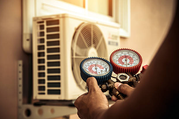 Professional Air Conditioning Service technician working in Riverside, NJ